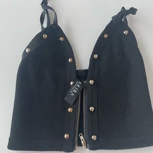 Black crop top tank with adjustable straps and zipper. Worn only a few times.